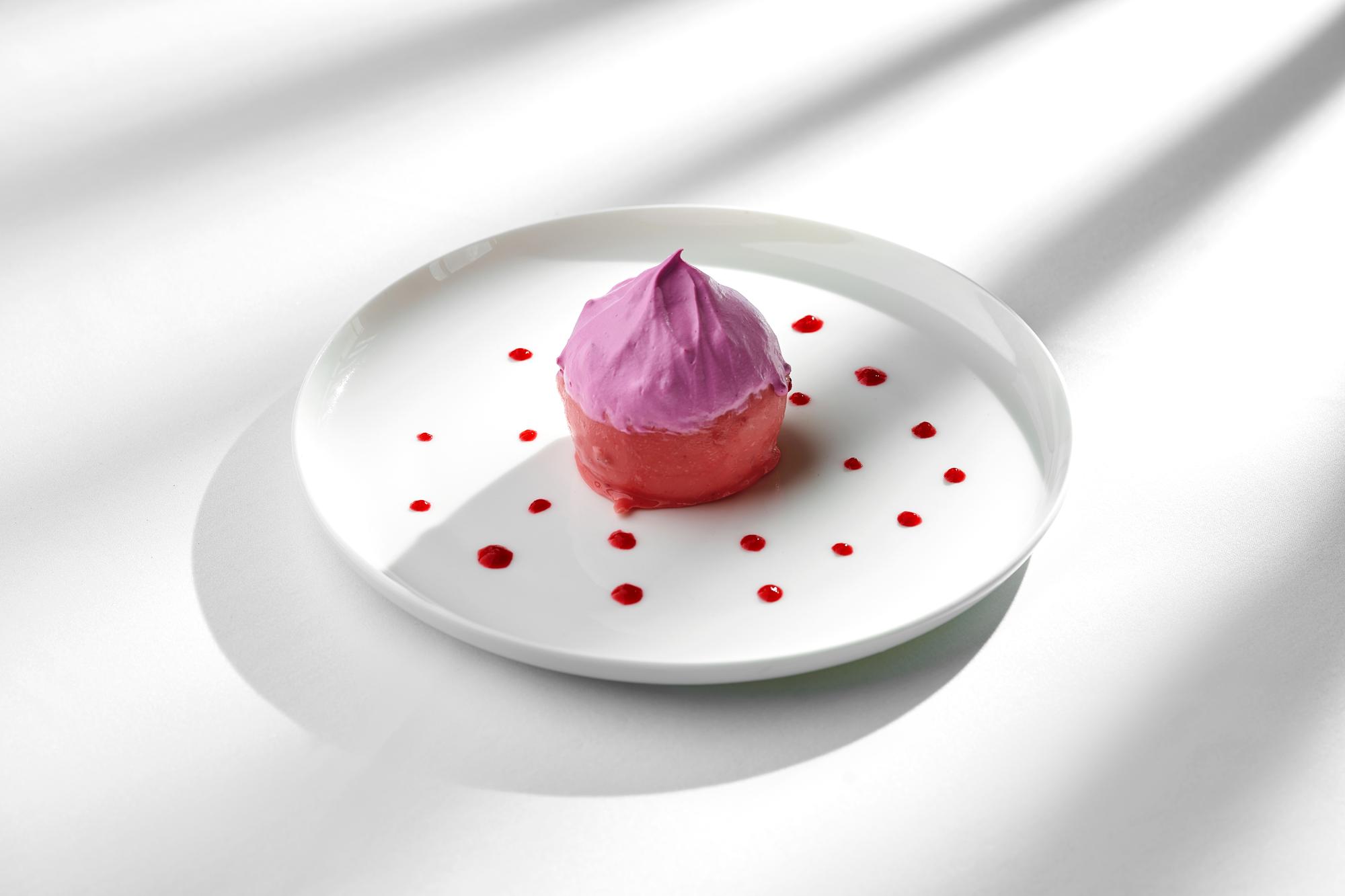 close-up of plated dessert with geometric garnish